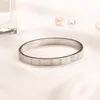 Bangle Lock Armband Diamond Tennis Armband Designer For Women Love Bangle Silver Charm Armband Clover Dhgates Flowers Free Frakt Medusa Armband Womens Bang