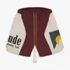 Rhude Shorts Men Krótkie designerskie spodenki Letnie moda suszenie Krótka wysokiej jakości moda streetwearu swobodne hip hop plażowe odzież sportowa Męskie Krótki 44K119