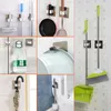 Kitchen Storage Wall Mounted Mop Organizer Holder Rack Self Sticking Brush Broom Hanger Hook Bathroom Mops Racks Drop 1pc Strong