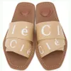 Designer Sandals tofflor Cork Flat Bottoms Fashionable Summer Slippers de mest populära strandklassiska kvinnliga tofflorna