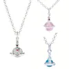 Collares pendientes Estrella Saturno vivi oeste estéreo globo de cristal suéter cadena luz lujo premium cadena de clavícula ventas al por mayor versión más alta bijoux cjewelers