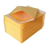 Nouveau 100pcs / lots Bubble Mailers Sacs Enveloppes rembourrées Emballage Sacs d'expédition Kraft Bubble Mailing Enveloppe Sacs 130 * 110mm Cbmgr