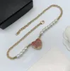 Kvinnliga juveler halsband designer högkvalitativ kristallpärla lång tröja kedja mode kvinnor hjärtformade hänge halsband tillbehör