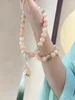 Collana di orecchini con radice naturale di Bodhi che tiene perline che suonano corde di perline di disco in stile cinese con pendente Hanfu Cheongsam