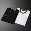 Ropa de diseñador Moda para hombre Camiseta de algodón Tops casuales Carta en el pecho Patrón de impresión bordado de lujo manga corta transpirable hombres ropa camisas Asia tamaño M-5XL