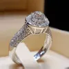 Caoshi jóias de luxo prata oco anéis anel de noivado zircônia cúbica redonda gemas anel de casamento nupcial mulher