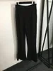 Kadın Pantolon Sonbahar Metal Zinciri Dekorasyonu Her iki tarafta yüksek bel ince uyum mikro parlama kadınlar için siyah