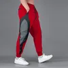 Pantaloni da uomo Europa e Stati Uniti Pantaloni sportivi Pantaloni da fitness da uomo di grandi dimensioni Quick Dry Running Training Color Men Loose Bomb 231107