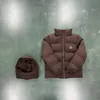 2023 Nouveaux hommes et femmes Doudounes Trapstarss Explosions Tide Marque Marron Petite étiquette Automne / Hiver Coton Top Mode Couple Manteau à capuche