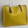 デザイナートート女性デザイナーバッグクラシックブランド高品質ファッション実用的なレザー大容量絶妙な手作りハイグレードハンドバッグ