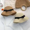 Beretten Hepburn -stijl Straw Hat Woman French Lady Bowknot Sun Vrouw Summer Beach Holiday Party Cap Sombrero Fedora