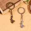 Chavedias fofas femininas de bolsa de bolsa de chaves de aço inoxidável de aço inoxidável Presente de Páscoa de anel de anel -chave para amigos crianças