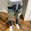 Men s jeans mode tvättade vintage hål blå ko katt skägg vaqueros hombre dragkedja använde tiggare byxor bootcut för män high street 231107