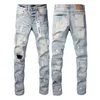 Pantaloni in denim jeans alla moda effetto consumato slim fit elasticizzati strappati di alta qualità in cotone blu americano di design PURP