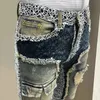 Men s jeans mode tvättade vintage hål blå ko katt skägg vaqueros hombre dragkedja använde tiggare byxor bootcut för män high street 231107