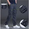 Qnpqyx nova primavera de outono calças de outono masculino casual calça de algodão regular de algodão de combate masculino calças táticas multi -bolsos