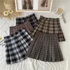 Skirts Vintage chic hit color plaid miniskirt arrival in spring and summer Kawaii pleated skirt high waist A-line Jupe women 230408