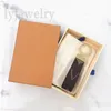 2023 designer key chain luxury keychain cowhide charm trend letters bag dragonne letter accessories street designer keychain wallet men canvas PJ047 F23