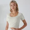 Kadın Yoga Sporları Kısa Kollu Tee Tee Üstü Pedler T-Shirt Mürettebat Boyun Çapraz Fitness Sportwear Düz Renkli Spor Giyim T979