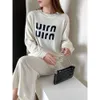 Outono 23 novo produto feminino tendência da moda europeia muito suave linha clara conjunto de letras top + saia de meio comprimento