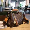 2023 TOP Cross Body Factory online sale Old flower bucket large capacity New Single Shoulder Messenger Bag Hand women's bag