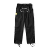 Pantaloni da uomo nuovi Pantaloni streetwear da uomo Hip Hop Pantaloni casual stampati Retro Multi-tasche Salopette dritta allentata Bottone Coppia pantaloni da allenamento gamba dritta