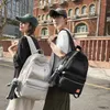 Sac à dos couleur unie multi-compartiments grande capacité tendance de rue étudiant et couple épaule homme/femme