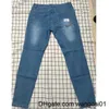 Herr jeans vita brodery jeans män bomull stretch rippade magra jeans högkvalitativa hiphop svart ho smala fit överdimensionerade denim byxor 0408h23