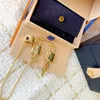 Moda damska Nieregularne złote kolczyki luksusowe projektantki Loctit Series For Women Classic Printed Logo Stud S925 Srebrna igła