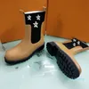 Mode bottes femme semelle épaisse bande élastique botte peau de vache souple dame plate-forme lettre chaussure