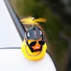Interior Decorations Automotive Products Gift Broken Helmet Small Yellow Car Decoration Accessories Wind Torn Duck Bicycle Riding Ornament AA230407