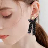 Boucles d'Oreilles Créoles Une Paire De Longs Paragraphes Pompons Noeud Noir Dentelle Douce Tempérament Flottant Frais