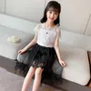 Ensembles de vêtements Costume pour enfants 2023 Été à manches courtes Deux pièces Petite fille Style occidental Robe en dentelle Dames