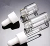 Atacado Perfume à prova de vazamento 1ml 2ml 3ml 5ml Garrafa de perfume sérico de vidro transparente com tampa de conta-gotas branca