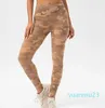 Stroje jogi Capris Camo Gym Leggingi biegnących fiess kobiet rajstopy drukowane spodnie sportowe