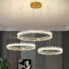 Lampadario a soffitto moderno di lusso nordico Negozio per interni Ristorante Soggiorno Lampade a sospensione Galvanotecnica Halo LED Lampade di cristallo