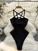 NXY Women Backless Slim Bodysuit Zomer Mouwloze band Bodycon Tops Vrouwelijke Sling Halter Black Sexy Playsuits Rompers 230328