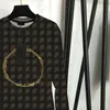 Brevtryck tunna tröja kvinnor mode lös rund nackskjorta designer high end pullover toppar