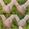 Pulseras con dijes 2 PCS Pulsera de pareja para mujeres Amante Arco iris Mal de ojo Con cuentas Cuerda trenzada Encanto turco Amistad Joyería Dhgarden DH4QZ