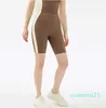 Contraste de couleur Cinq points Shorts de yoga Pantalons Taille haute Hanche Levage Filles Été Courir Fiess Leggings Traceless Nude Sous-vêtements de sport