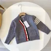 Pull Automne et hiver nouveau pull de créateur pour enfants chemise en tricot bouton ras du cou pour garçons et filles vêtements de mode décontractés pour enfants si