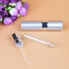 Portable 8ml vaporisateur rotatif en aluminium anodisé vaporisateur bouteilles de parfum verre vide maquillage parfum tube bouteille nouveau