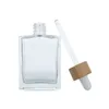 Flacon compte-gouttes en verre de luxe, carré et plat, rectangle, 15ml, 30ml, 50ml, 100ml, 4 oz, avec bouchon compte-gouttes en bambou, pour sérum, huile essentielle