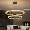 Lampadario a soffitto moderno di lusso nordico Negozio per interni Ristorante Soggiorno Lampade a sospensione Galvanotecnica Halo LED Lampade di cristallo