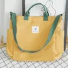Duffel Bags Koreaanse versie van stoffen tas met grote capaciteit kleine en frisse one-shoulder cross-body kunst vrouwelijke student Japanse canvas