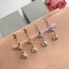 Pendientes de tuerca de marca de diseñador, joyería de moda para mujer, pendiente de Saturno, pendiente de perla de Metal, cjeweler, orecchini 54dwsa