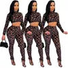 Pantaloni a due pezzi da donna 2023 Designer di lusso da donna Set stile vacanza sexy Manica lunga Girocollo Top elastico stampato 2 Set