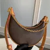 Nouveau sac de mode de créatrice 5A Half Moon Sacs d'épalage Loop Handbag Crescent Pouch Baguette Sac délicat