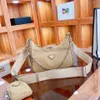 2023 Moda Yeniden Sürgün 2005 Naylon Kadın Sınır Tasarımcıları Çanta Lady Womens Erkek Crossbody Tote Hobo Omuz Çantaları Çanta Çanta Cüzdan