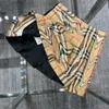 Trechsuits de designer infantil Conjunto de outono de 2pcs jaqueta de lapela xadrez e design de retalhos de retalhos saia curta roupas de menina